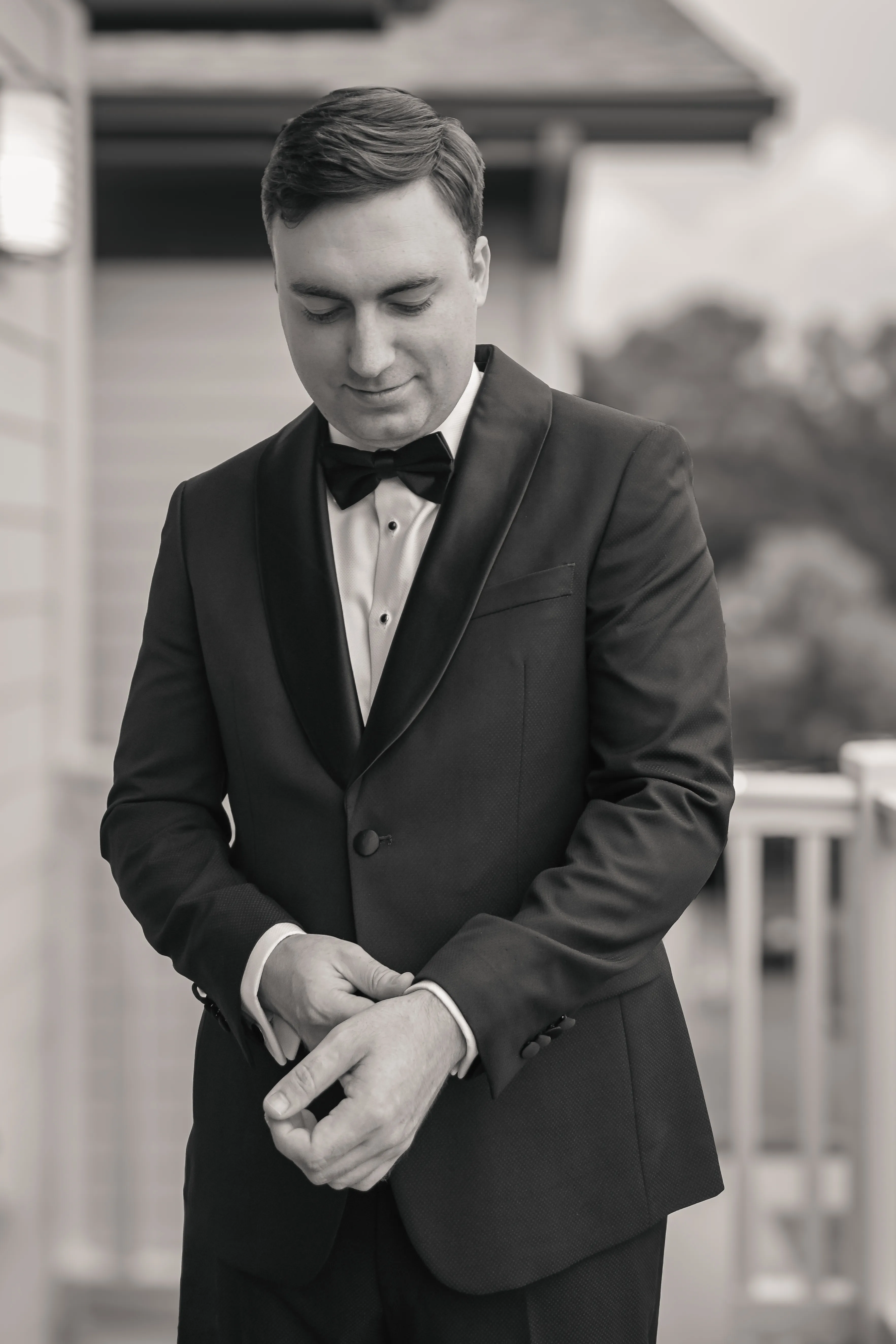 Black and white portrait of Mike Loerop in a tuxedo, owner of Loerop Photography