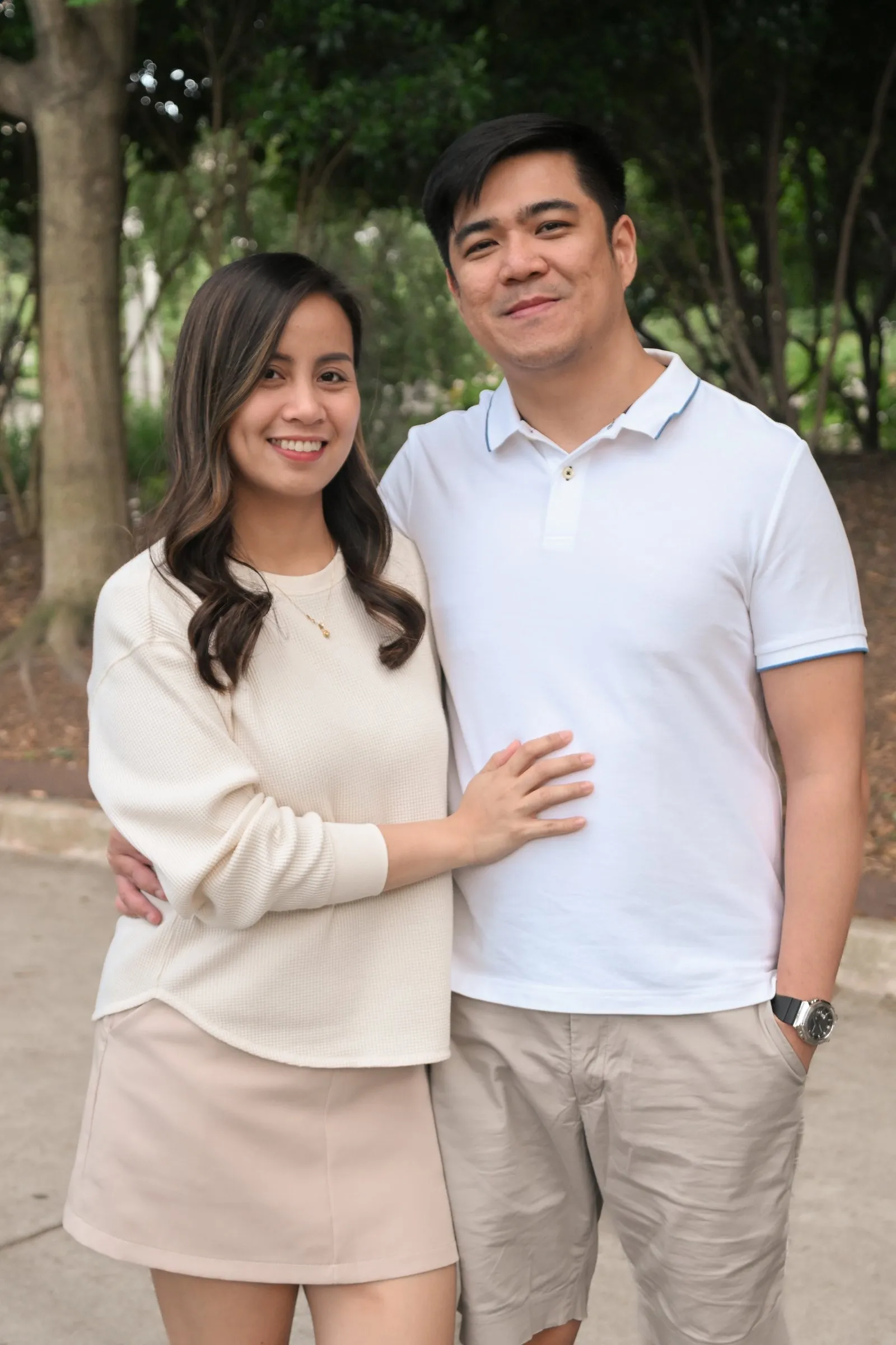 Couple portrait of Jessica and Jet on the tree-lined path