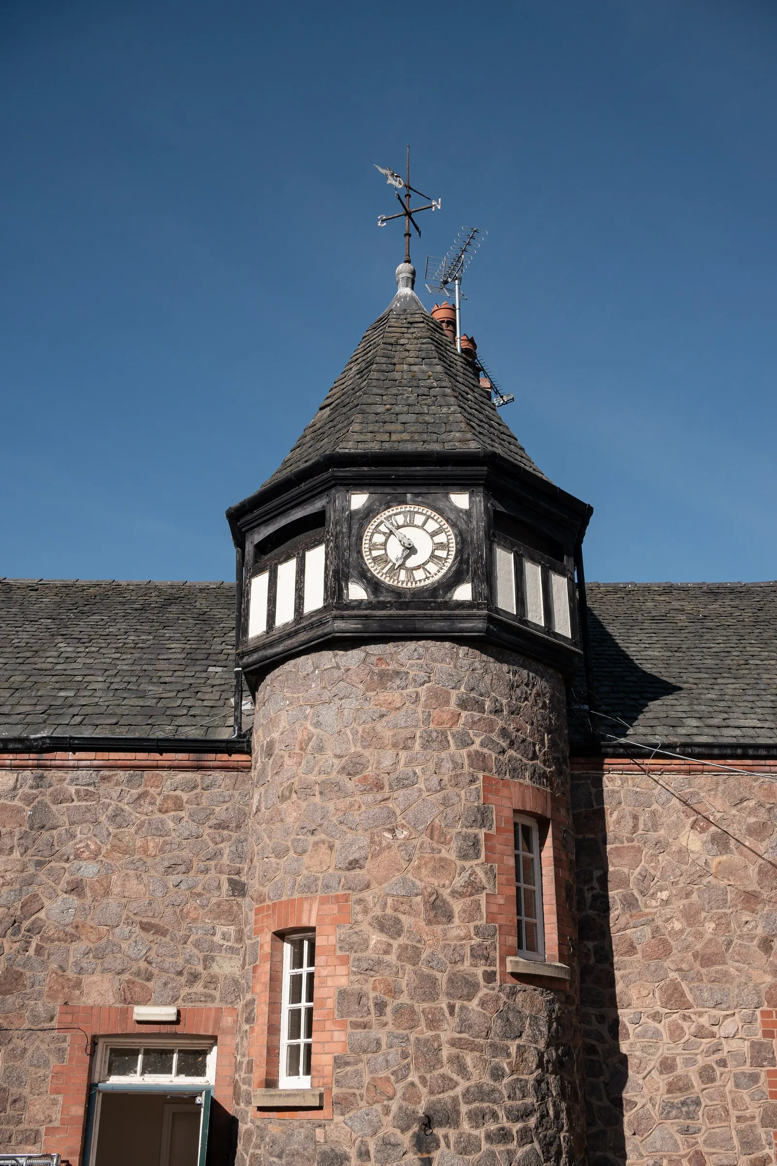 Rothley Court's clock tower against a clear blue sky