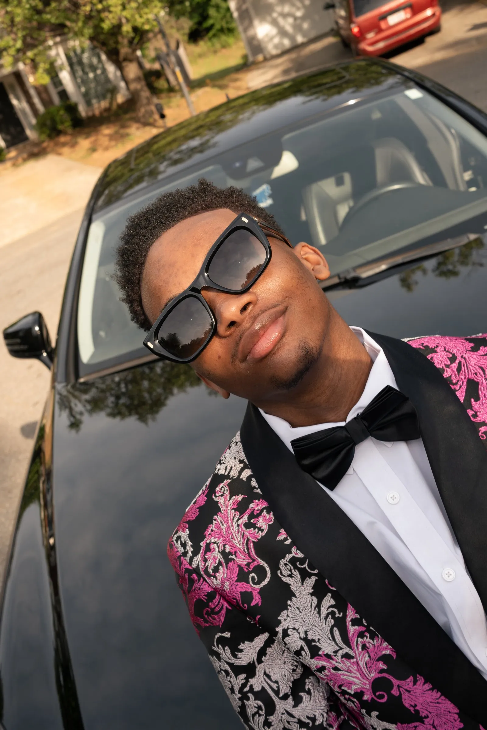 Close-up in sunglasses against the Mercedes windshield