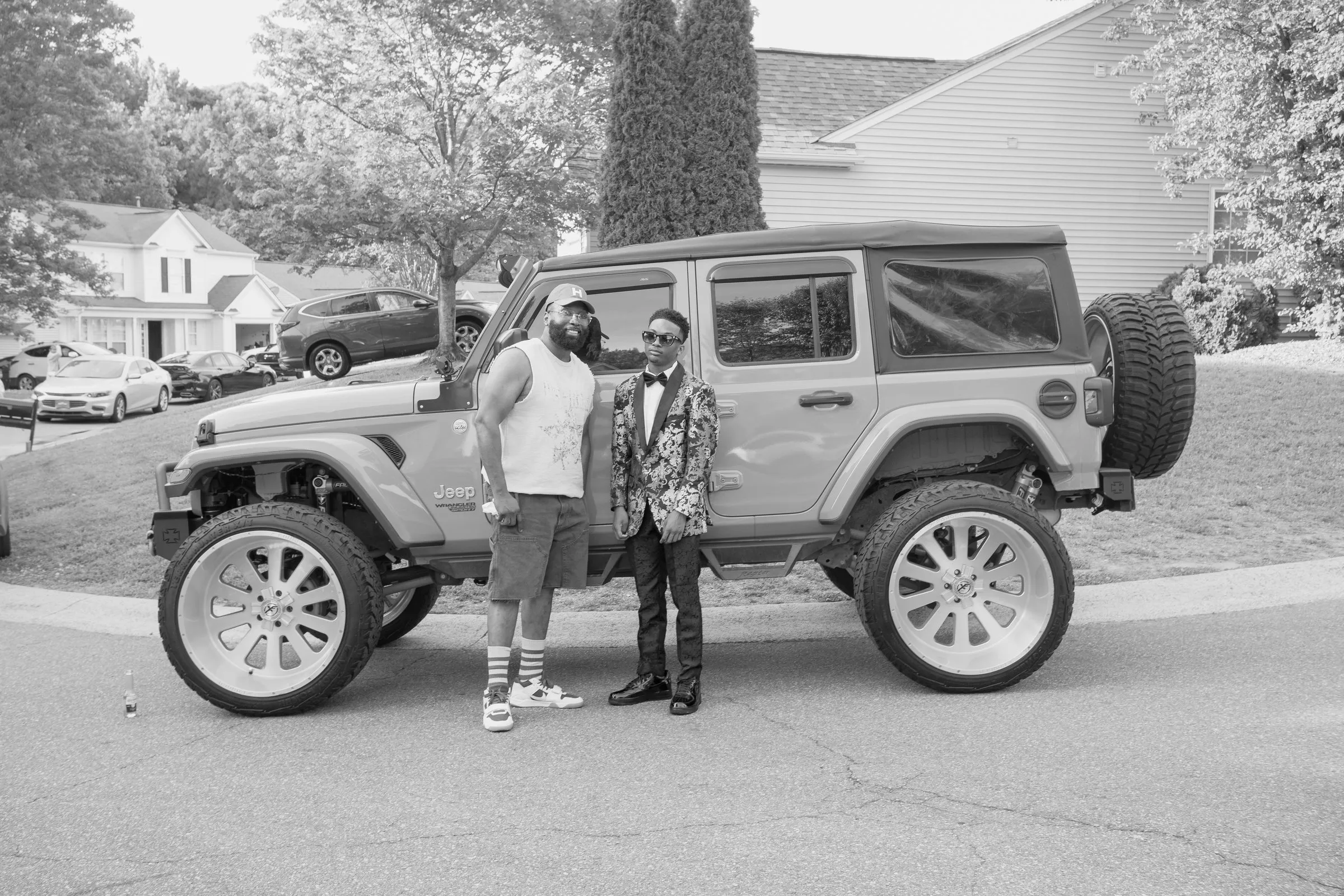 Black and white wide photograph with the lifted Jeep Wrangler