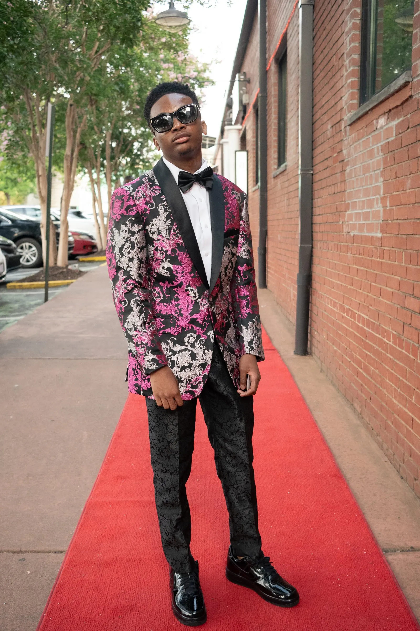 Full length prom portrait on the red carpet outside The Hamilton Event Spaces